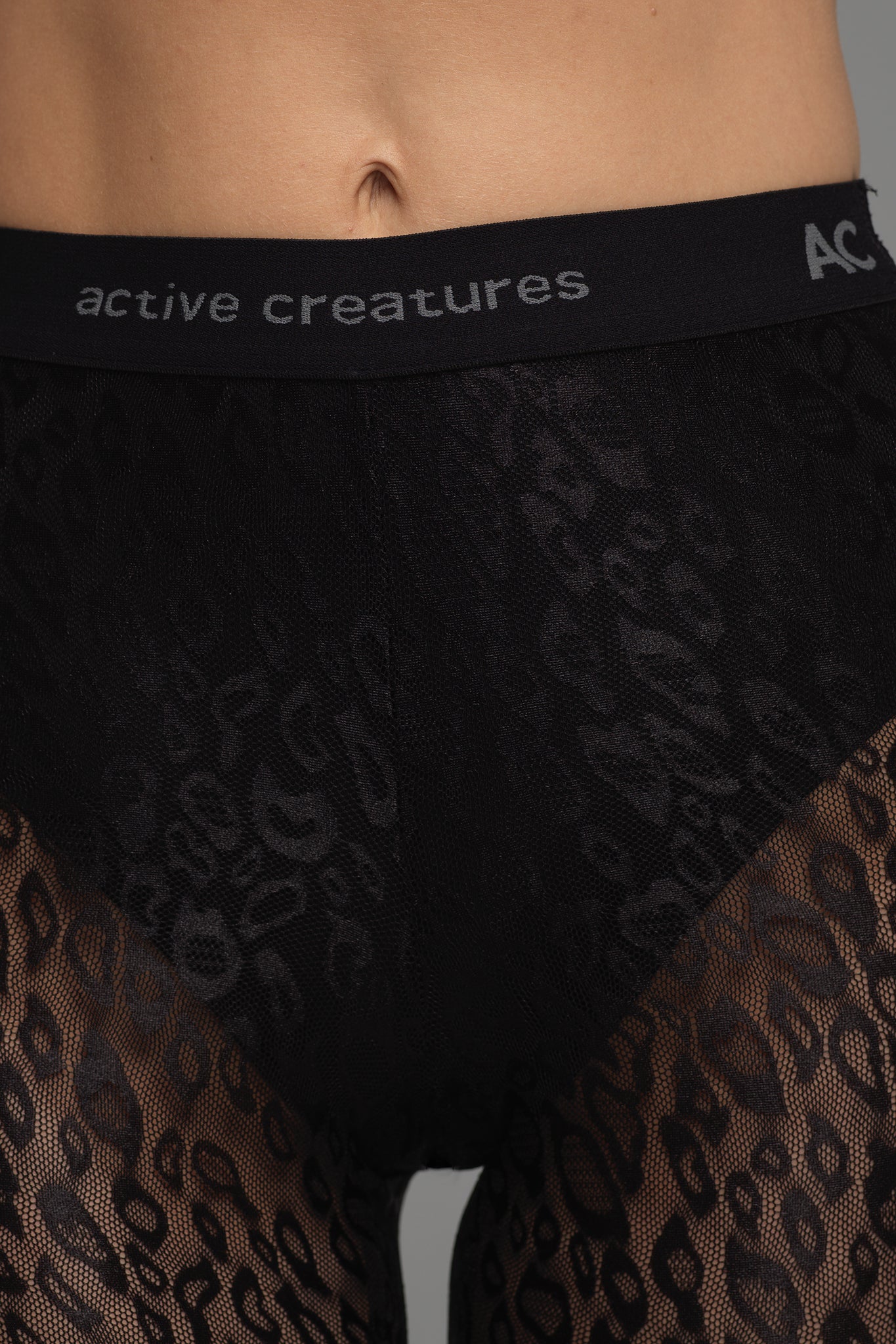 Racy Lacy 7/8 Tights in black animal print (front close up view)