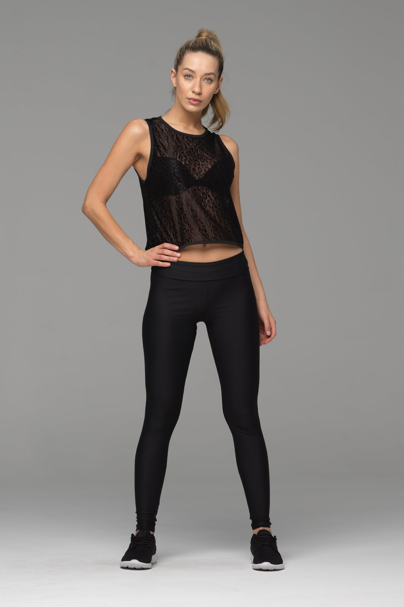 Billion Dollar Baby full length legging in solid black. Shown here with waistband rolled down