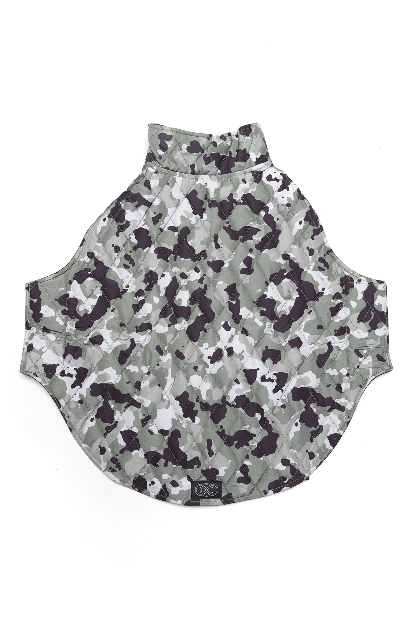 Foxtrot Dog Jacket in Camo Print laid on floor to show exterior of jacket when opened.