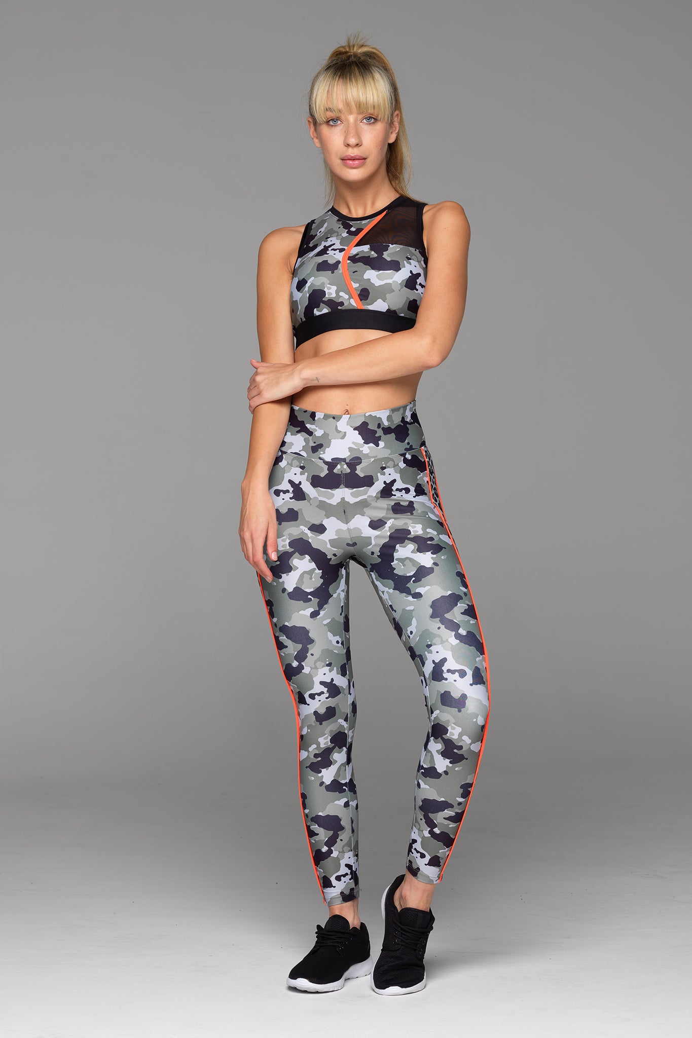Full length photo of Tour of Duty Sports Bra in Camo Print and matching Charlie 7/8 Length Leggings.