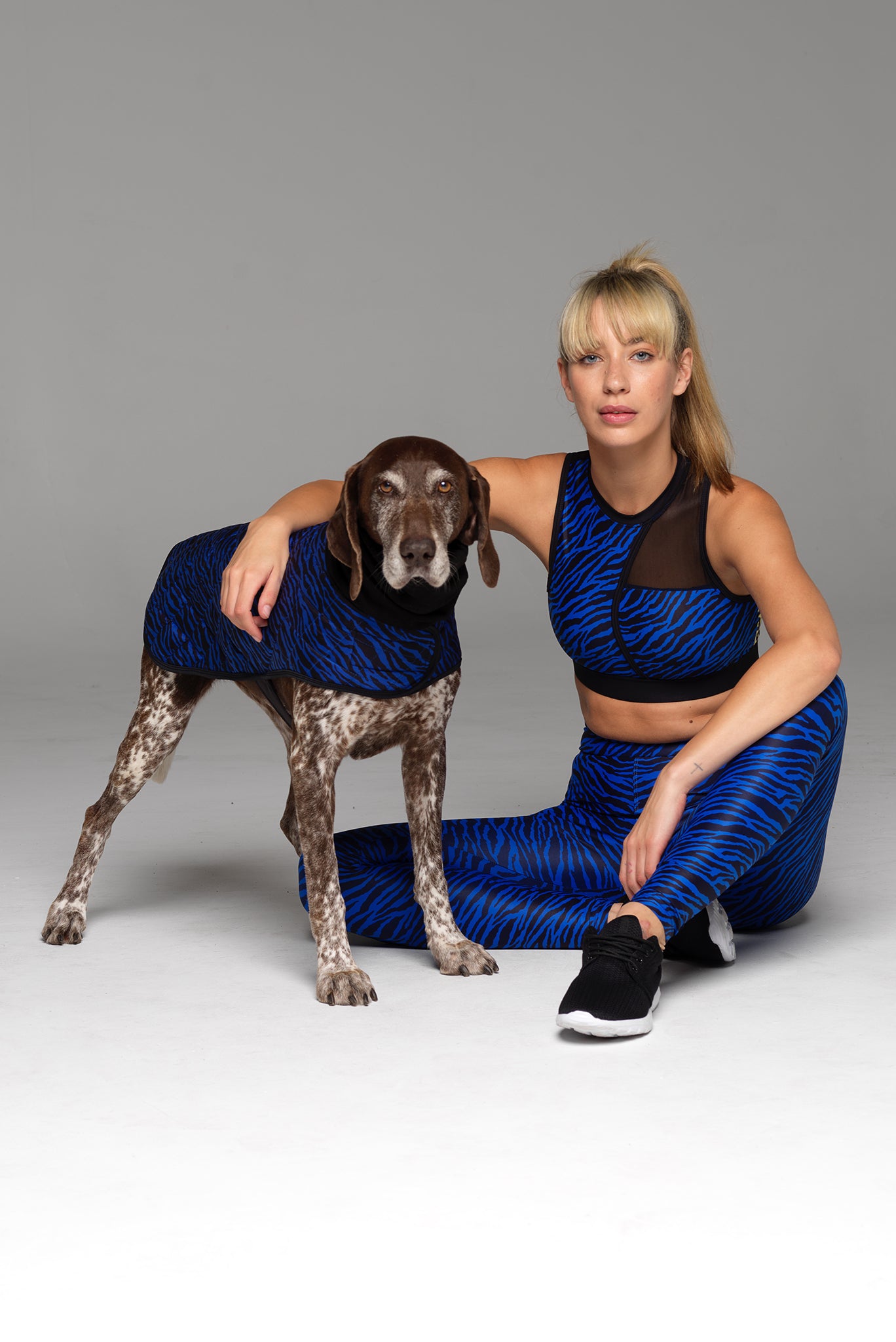 Fancy a bit of matchy-matchy? Model & Dog shown in matching Blue Zebra print outfits.