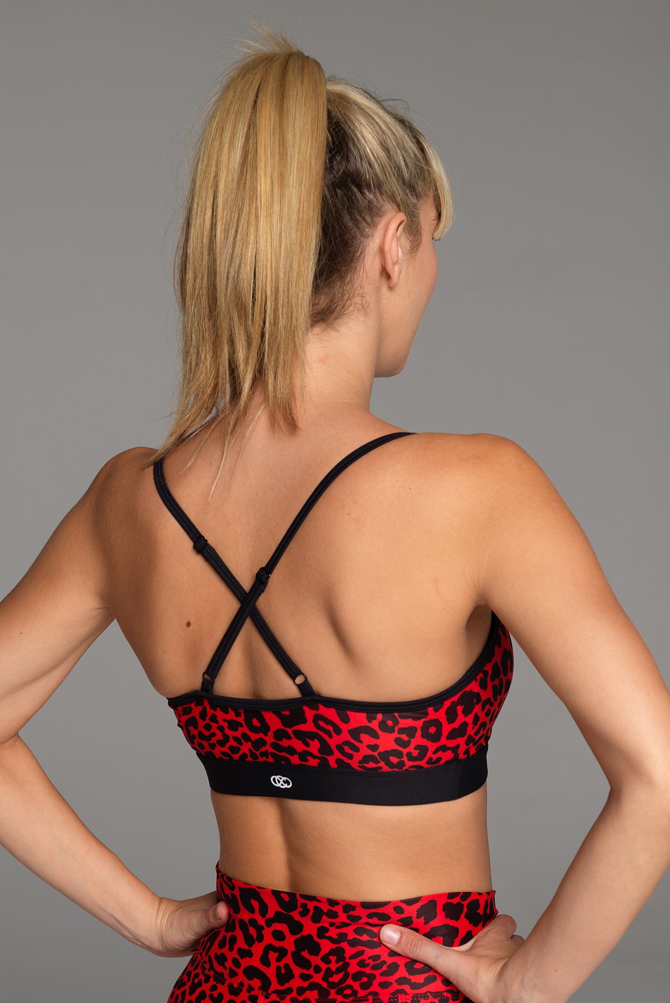 Back view of the Love Fool sports bra in racy red. Bra straps at back adjust.